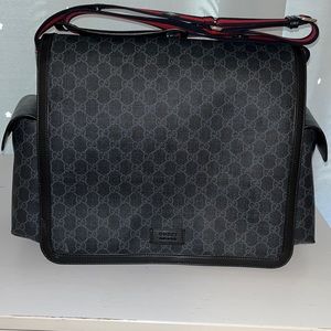 Gucci Supreme diaper bag, black/grey color with blue and red Gucci strap